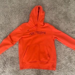 Arcteryx orange hoodie